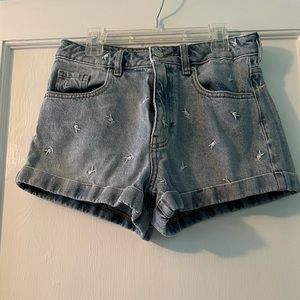 Pacsun size 26 (small) playboy bunny jean shorts. Light wash.
